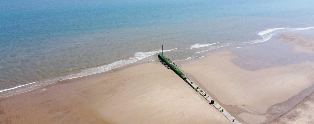 An arial view of Mabelthorpe beach at low tide