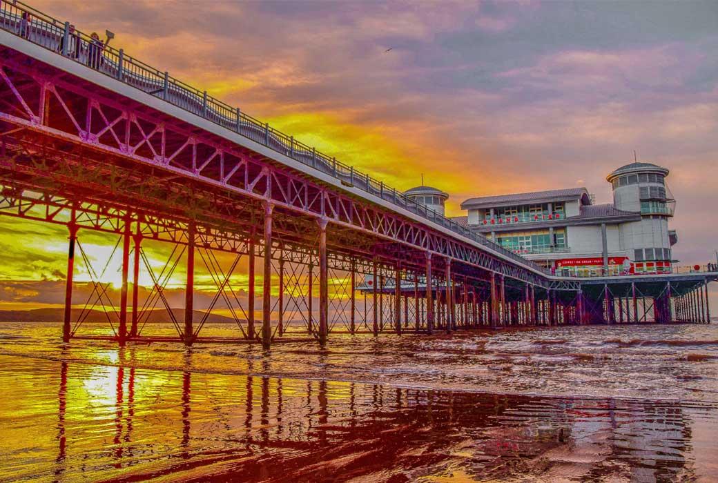 Sunset through a Peir on a Beach in Somerset