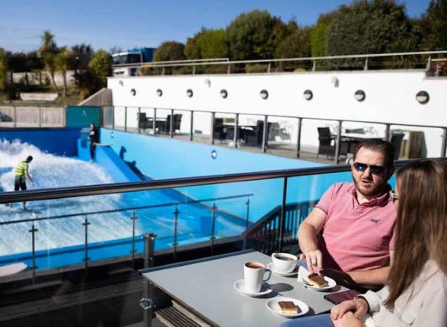 enjoy watching the surfers on the Flowrider