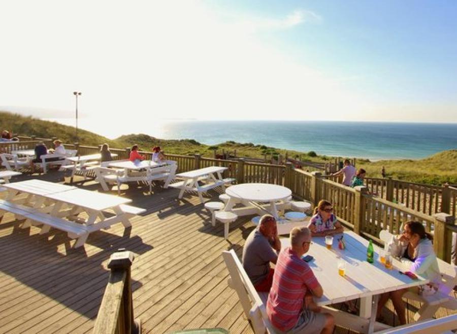 eating on the balcony overlooking the sea
