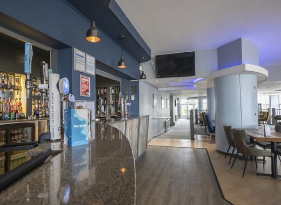 Swanage Bay View Holiday Park bar with seating area