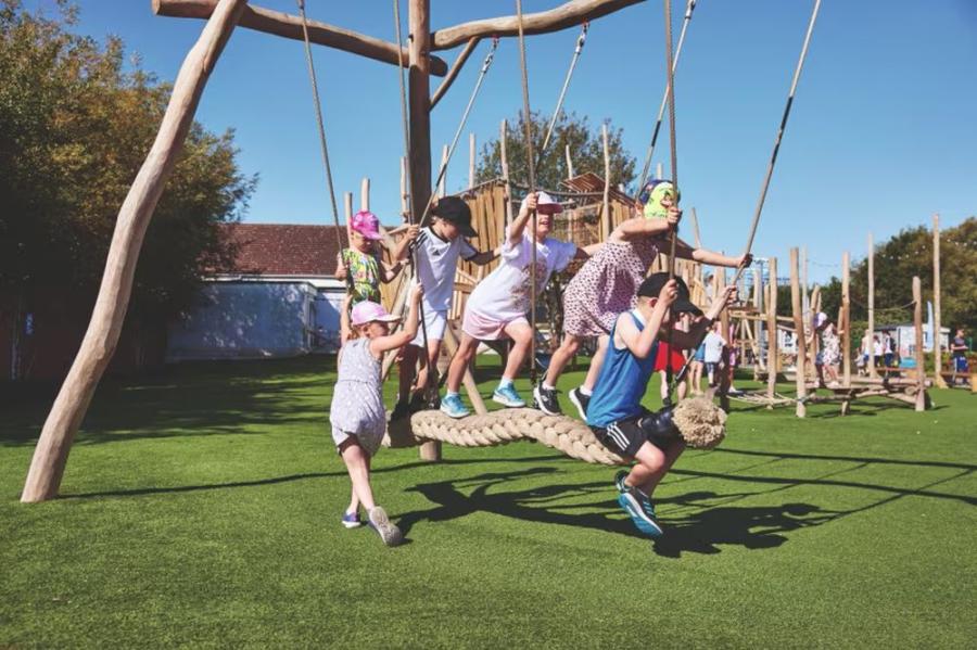 swings in the playground at Cleethorpes Beach Holiday Park