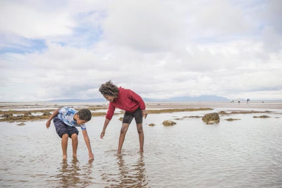 exploring the beach at Craig Tara Holiday Park in Ayr