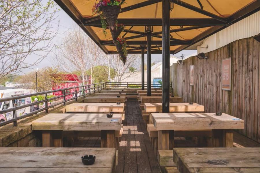 outside seating for eating and drinking at Craig Tara Holiday Park