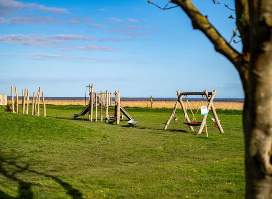 adventure playground with swings