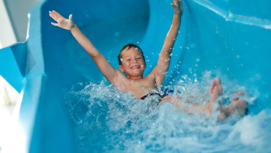 going down the flumes on holiday at Carmarthen Bay Holiday Park