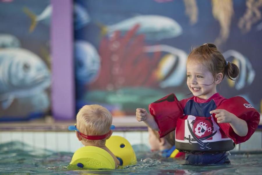 toddlers in the indoor pool at Church Farm Holiday Park