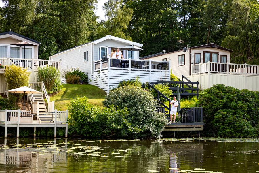 luxury lodges overlooking the lakes at Coghurst Hall Holiday Park