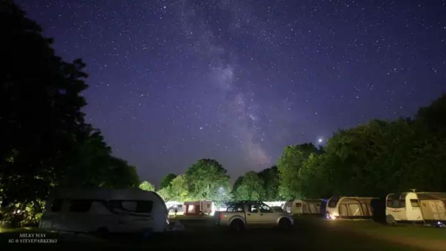 Lytton Lawn Touring Park at night under the starry skies