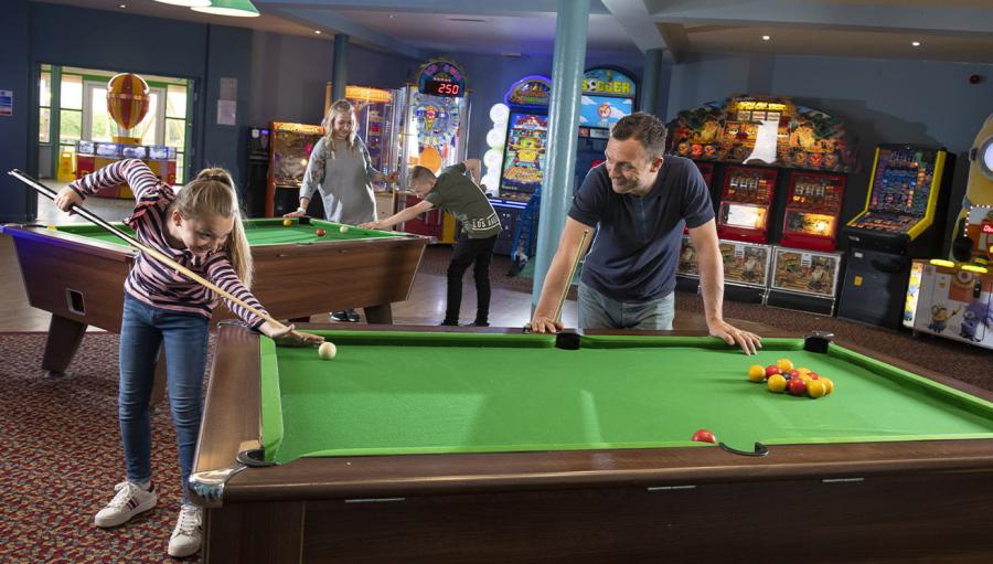 playing a game of pool on holiday