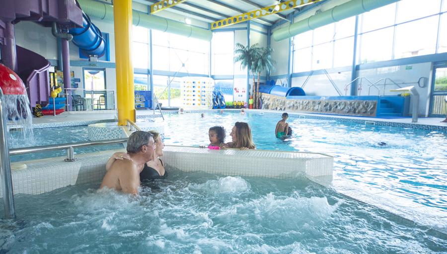 indoor pool with jacuzzi at Southerness Holiday Park
