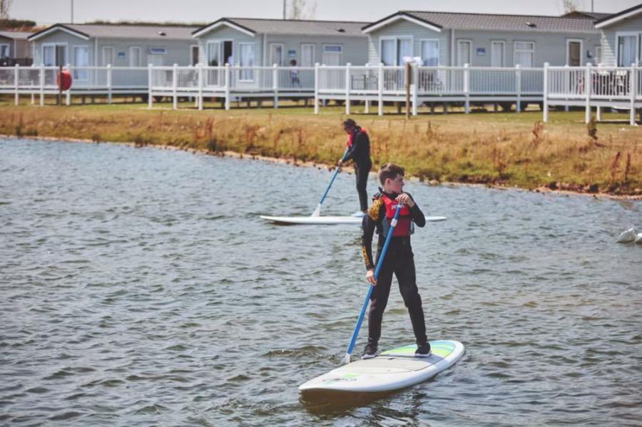 try stand up paddle boarding on holiday in Yorkshire