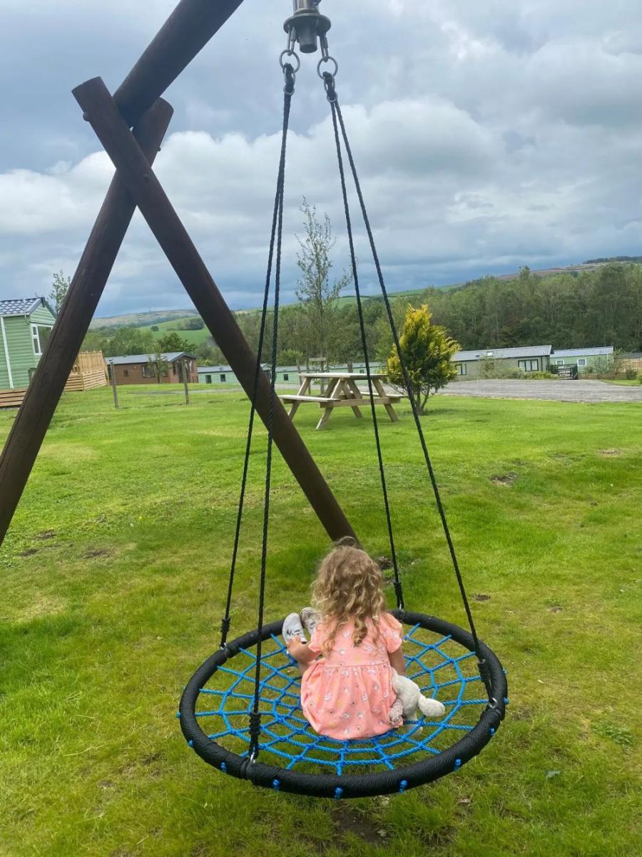 playing on the swings on holiday