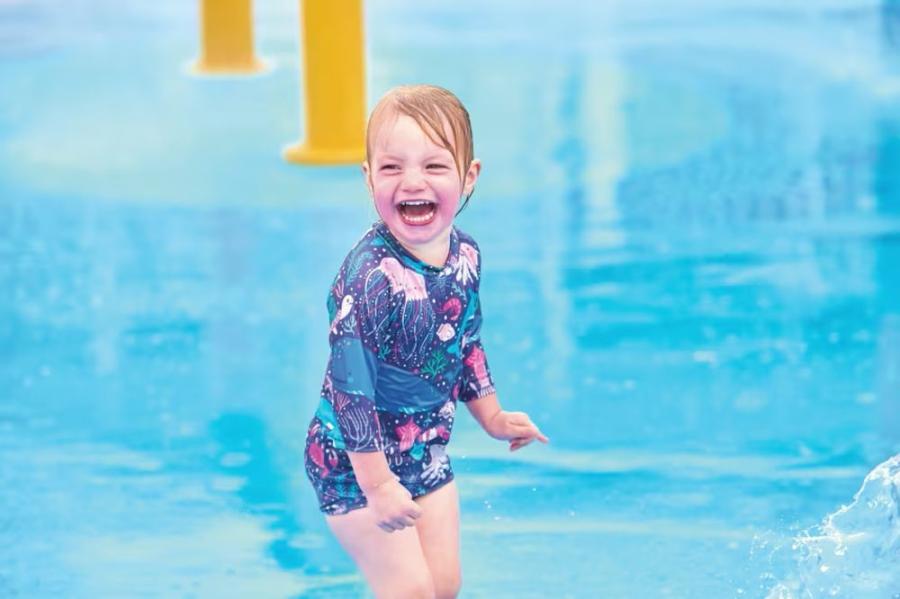 having fun in the outdoor splash zone