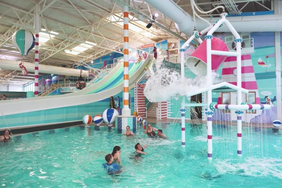 the full swmming pool with waterslides in Wales at Hafan-Y-Mor Holiday Park