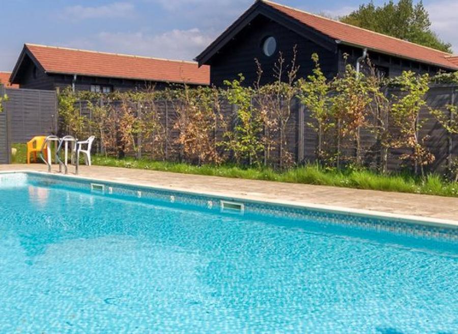 the outdoor swimming pool at The Lakes Rookley Holiday Park
