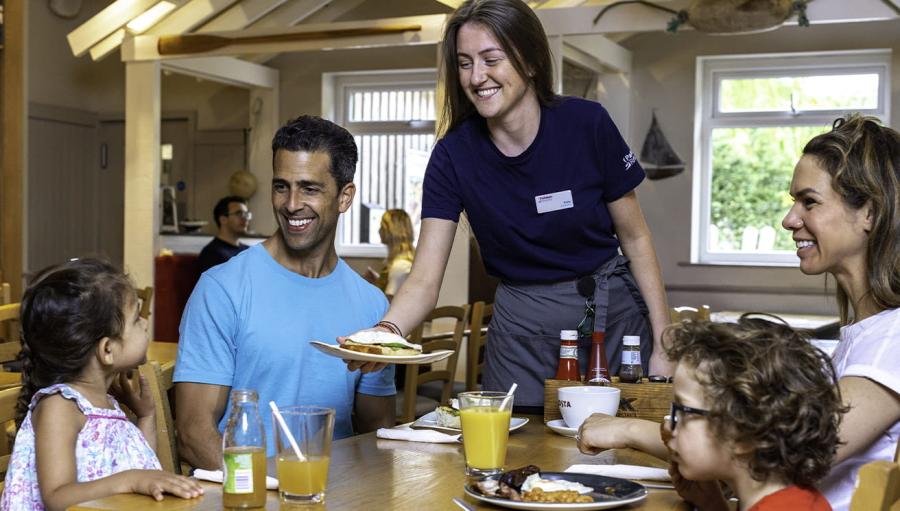 having food in the restaurant at Regent Bay Holiday Park