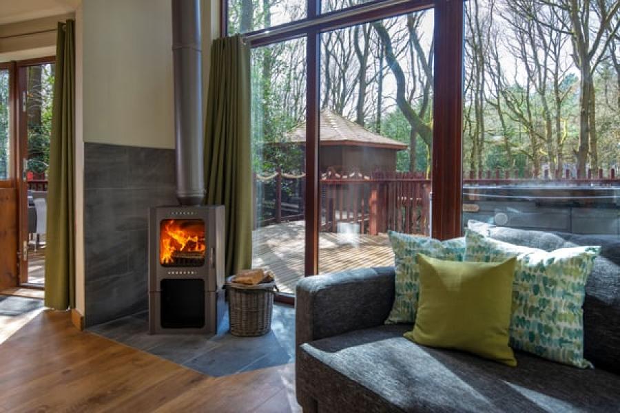 inside a luxury log cabin lodge at Thorpe Forest