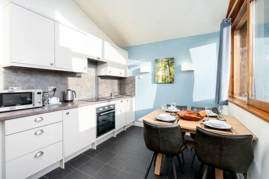 luxury log cabin kitchen at Sherwood Forest lodge park in Nottinghamshire