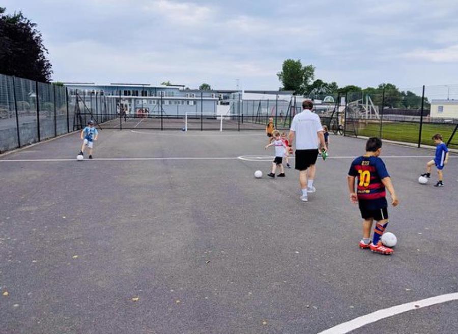 playing football in the courts at Cleethorpes Pearl Holiday Park