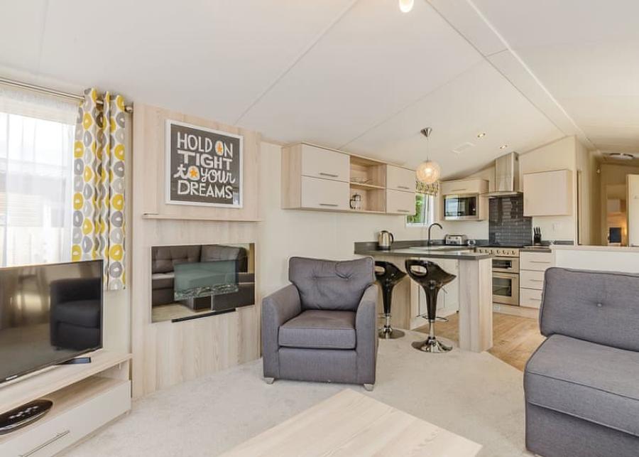 the lounge area in a luxury lodge