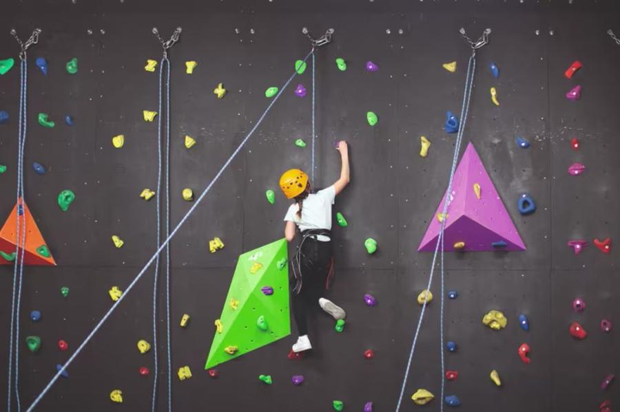 the climbing wall, one of many activities at Lydstep Beach Holiday Park