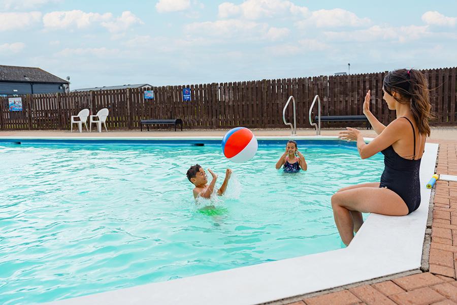 the outdoor swimming pool at Steeple Bay Holiday Park