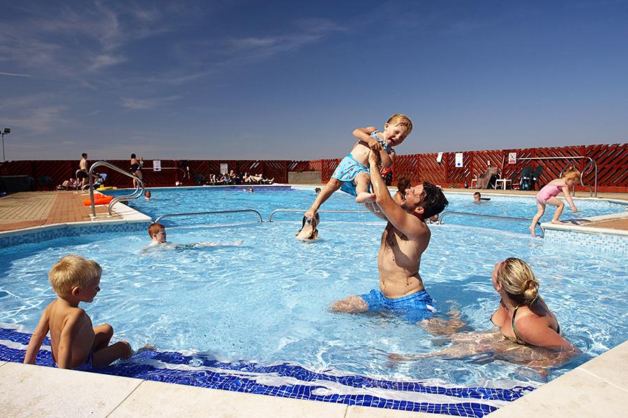 family having fun on holiday at Steeple Bay Holiday Park in Essex