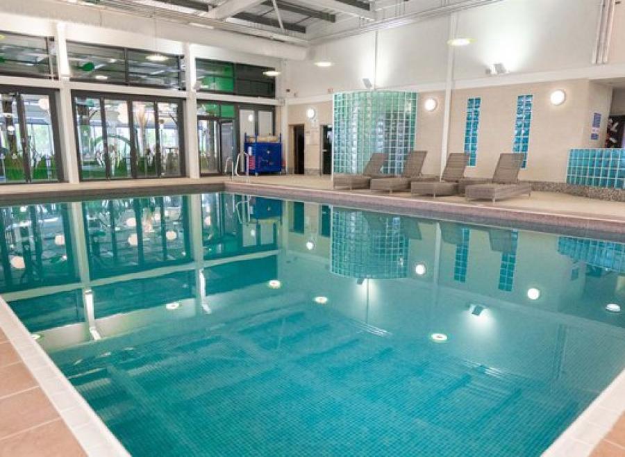 seating by the indoor swimming pool