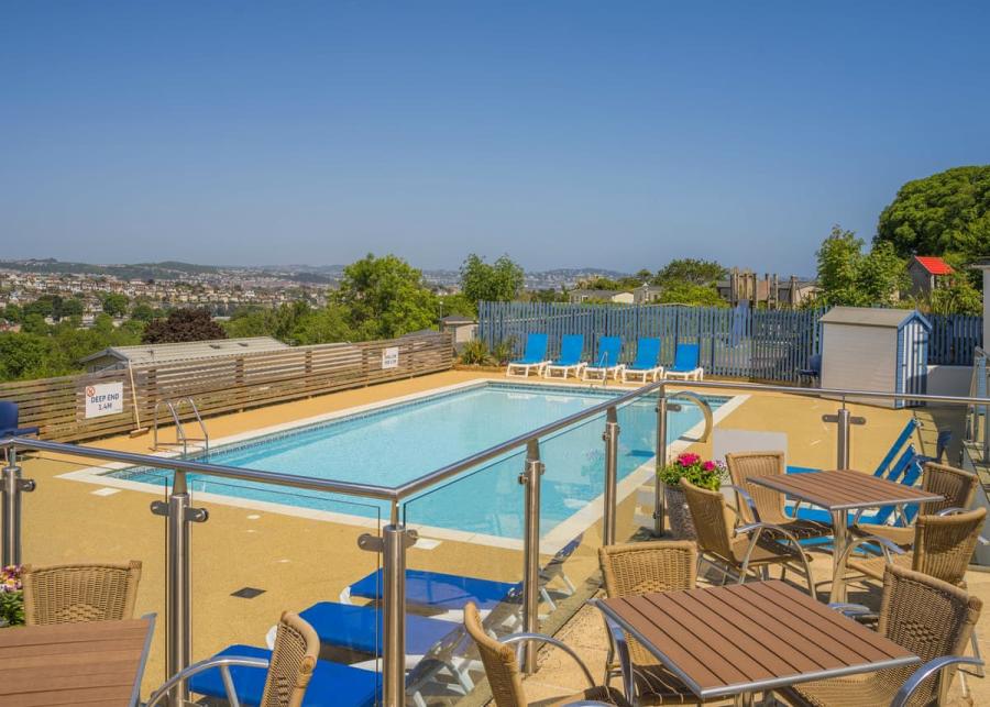 sunbeds by the outdoor pool at Beverley Park