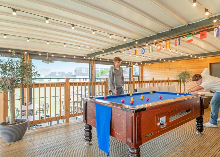 playing pool on holiday at Clawford Lakes Resort and Spa