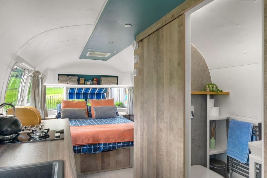 open plan living area in a renovated airstream caravan, devon