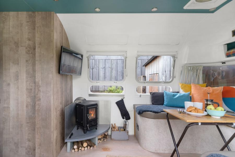 woodburner in a renovated airstream caravan, devon