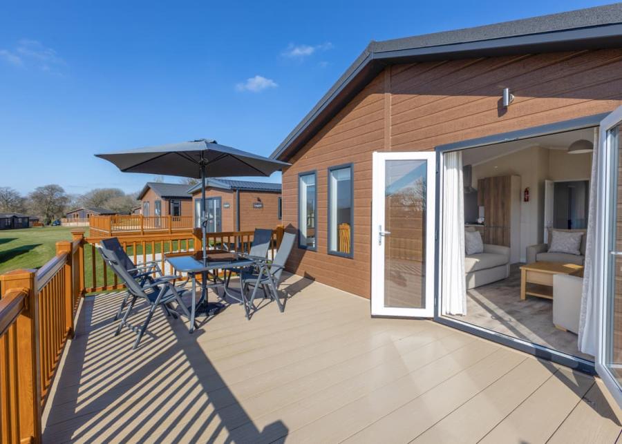 lodges with private decking at doublebois holiday park cornwall