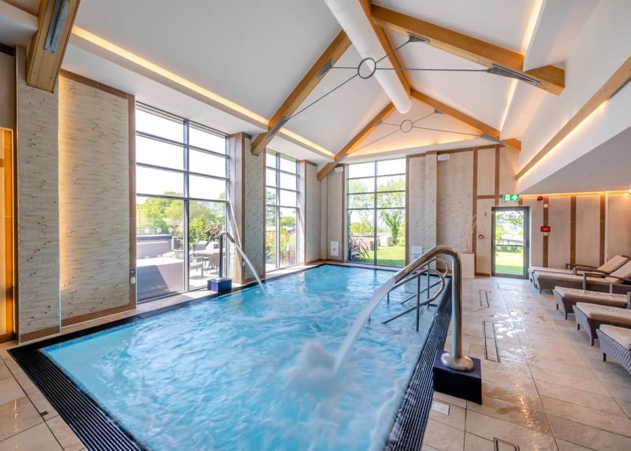 the indoor swimming pool at Hawkchurch Resort and Spa lodge park in Devon