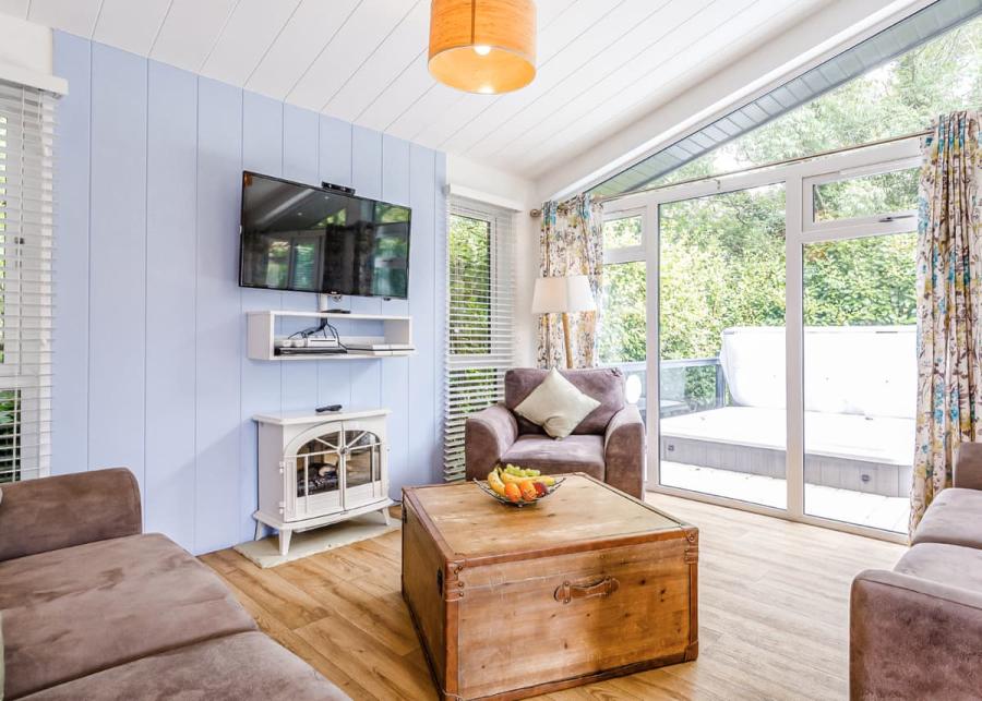 open plan living area in luxury lodge at mullion cove coastal retreat near lizard Peninsula 