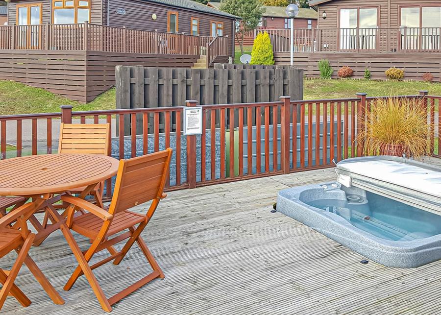 luxury lodge with private hot tub at shear barn holiday park in sussex