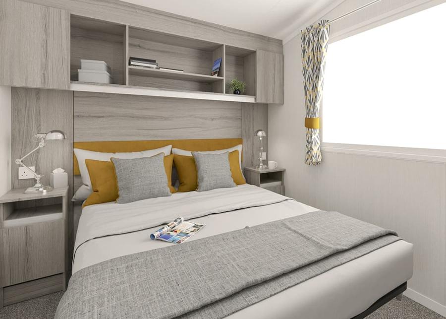 bedroom in a caravan at the orchards holiday park in the isle of wight