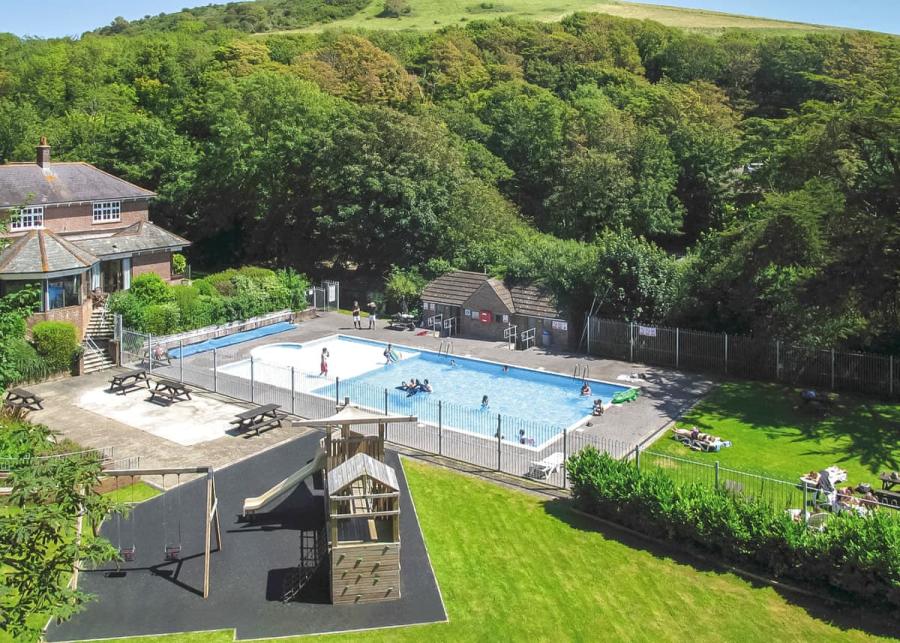 outdoor pool at views from a lodge at osmington mills lodge park