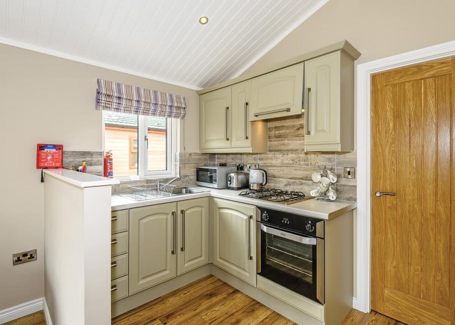 kitchen in a luxury lodge at crake valley holiday park in the lake district