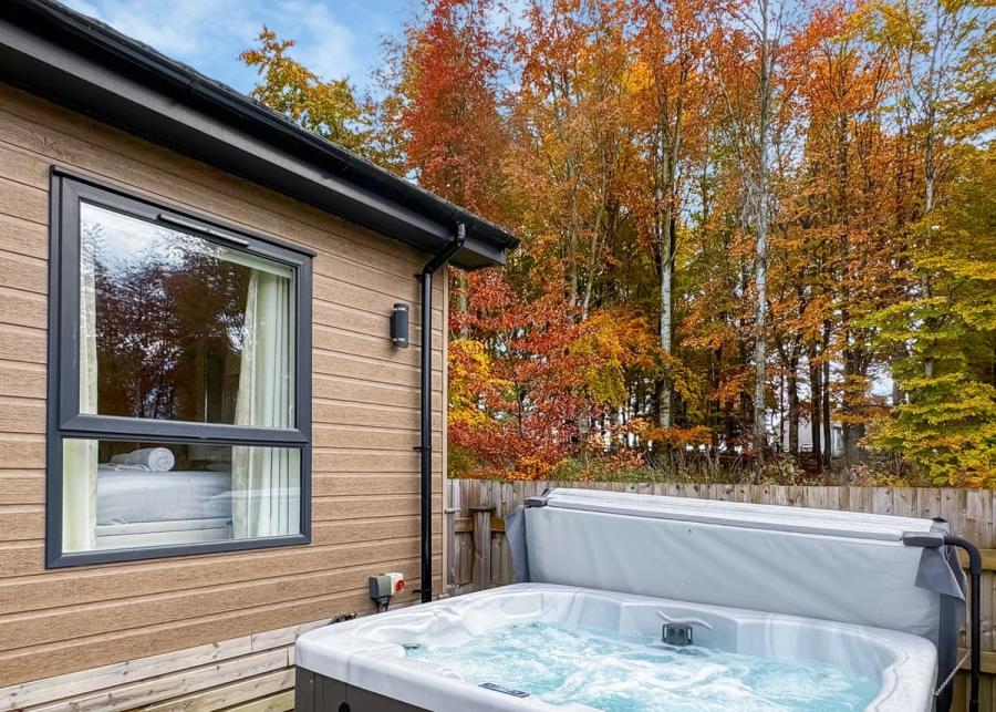 hot tub holiday lodge breaks at flusco wood holiday lodge park 