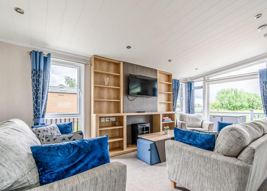 lounge in a luxury lodge at hanworth country park