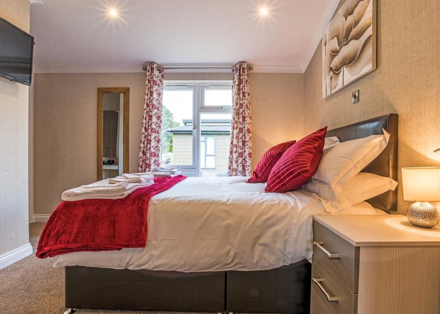 double bedroom at woodhall country park lodges