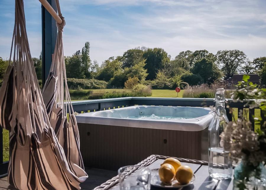 private hot tub holiday at fairway lakes lodges near fritton 