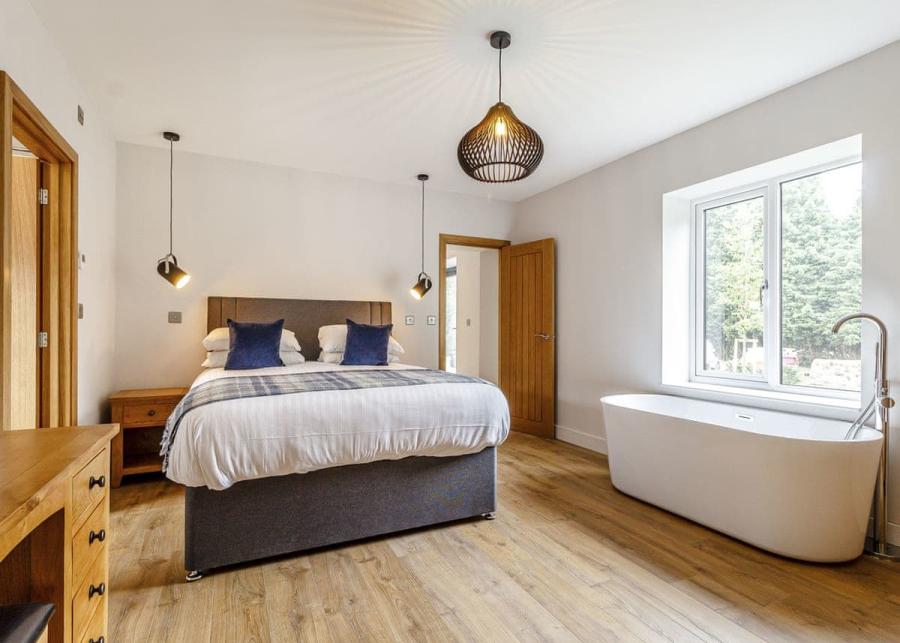 bedroom at redbrick woodland lodges 