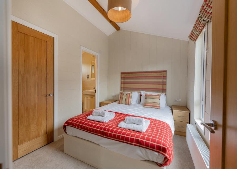 double bedroom at yaxham waters holiday park