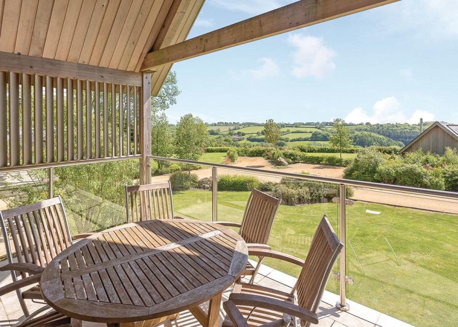 private balcony at swandown lodges in chard