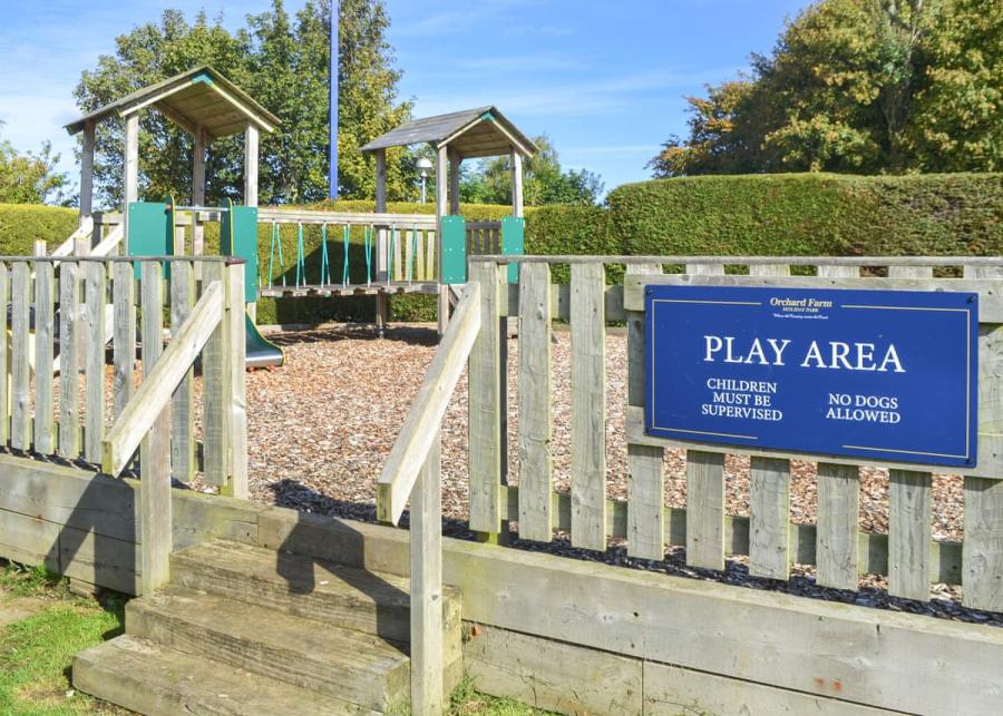 play area at the cottages at orchard farm in filey