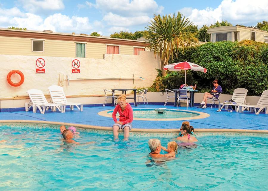 outdoor swimming pool at fishguard holiday park in pembrokeshire