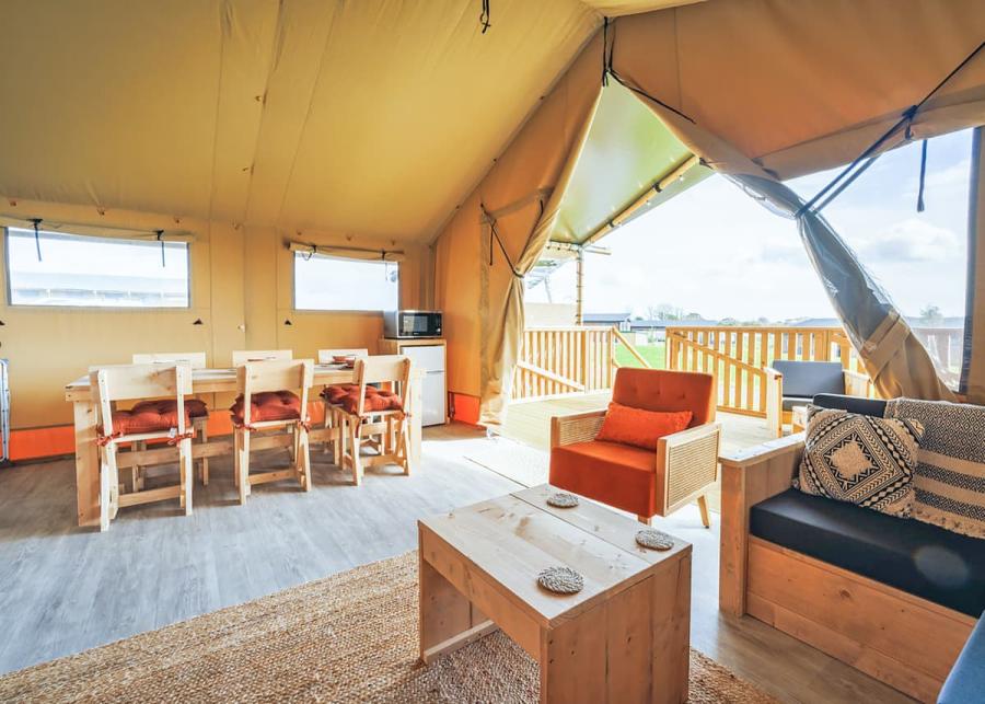safari tent interior at folly farm holiday park in kilgetty